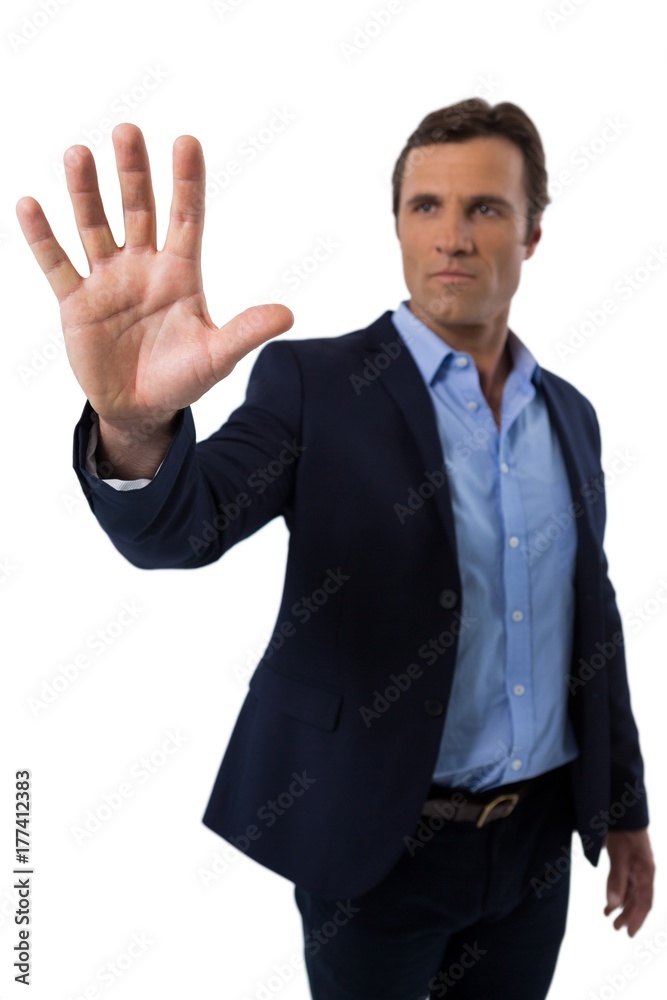 Businessman touching the invisible screen Businessman touching the invisible screen