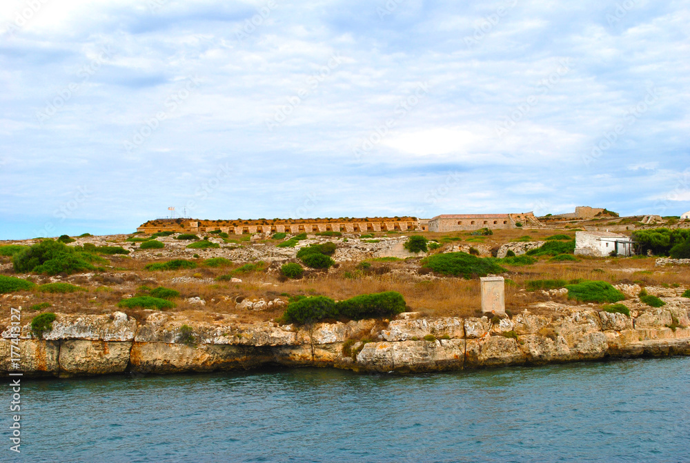 View from tourist boat at Fortalesa de la Mola fortress.