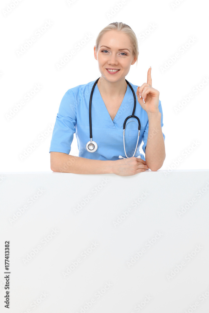 Smiling young doctor or nurse portrait isolated over white background. Smiling young doctor or nurse portrait isolated over white background.