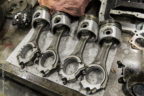 Piston on Workbench in Auto Repair Shop