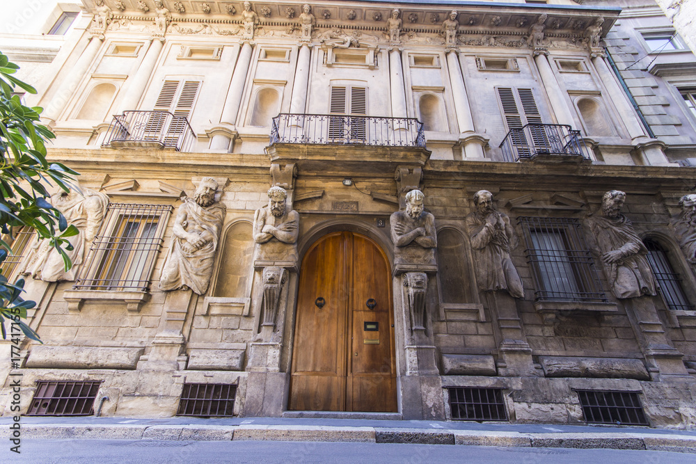 Casa degli Omenoni, a historic palace of Milan was designed by sculptor Leone Leoni for himself. It owes its name to the eight atlantes decorating its facade, termed omenoni (big men in Milanese)
