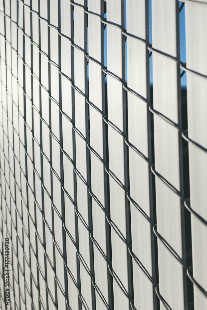 Detail of urban chain-link fence Detail of urban chain-link fence