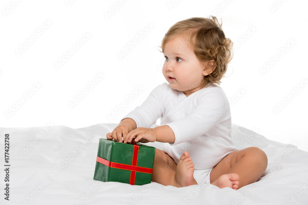 toddler girl with wrapped present toddler girl with wrapped present