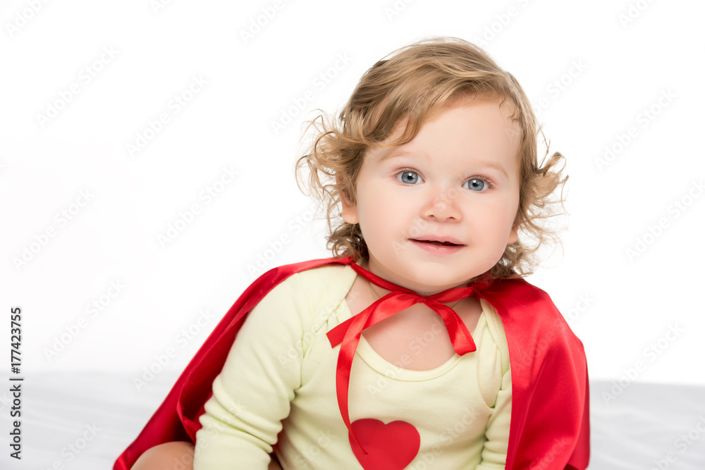 adorable toddler in superhero cape