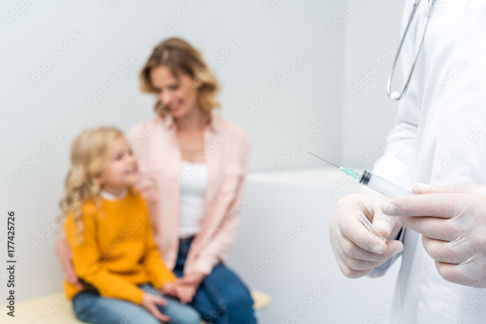 pediatrist with syringe for injection pediatrist with syringe for injection