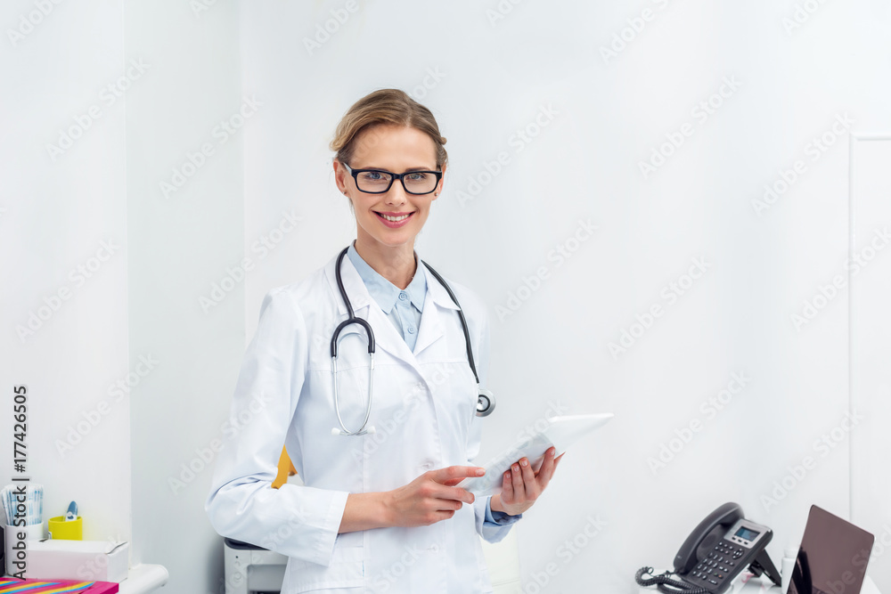 female doctor using digital tablet female doctor using digital tablet