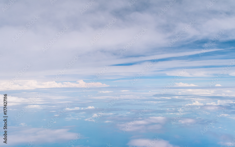 the view of blue sky and white cloud from the airplane window the view of blue sky and white cloud from the airplane window