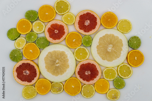 Slices of various citrus fruits