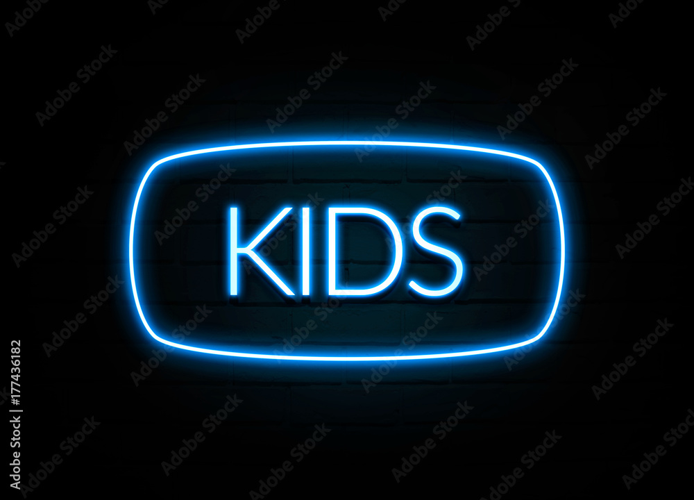 Kids - colorful Neon Sign on brickwall Kids - colorful Neon Sign on brickwall