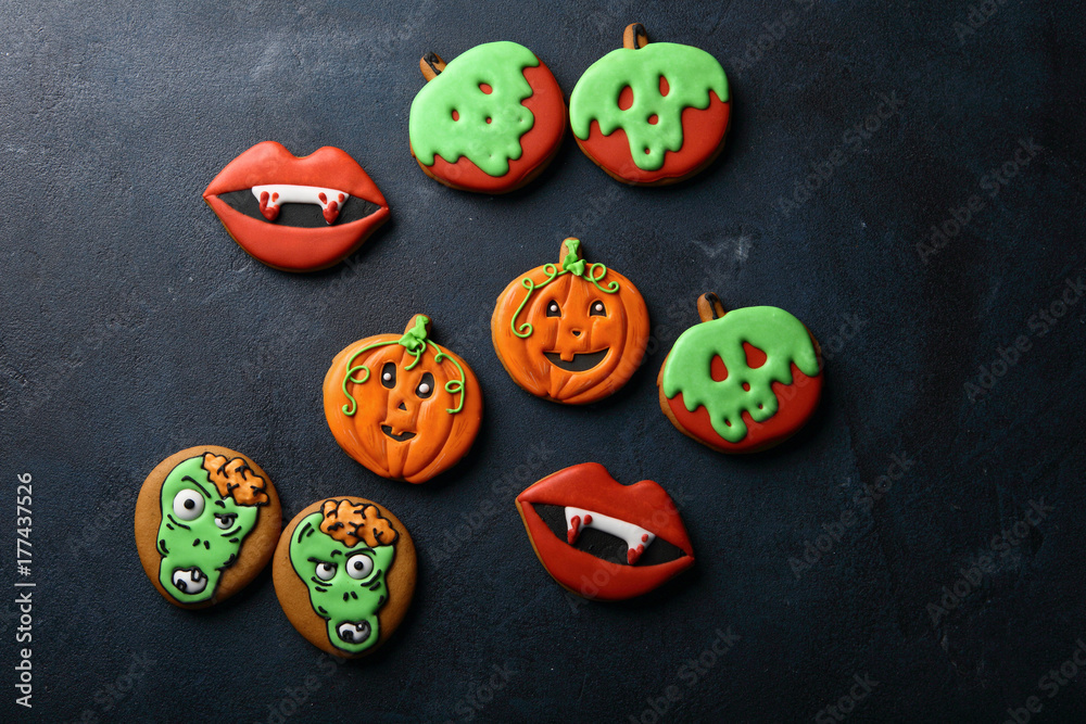 Funny Halloween treats on dark background