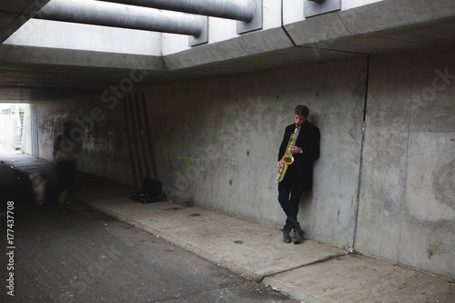 Wallpaper Mural Saxophone player in urban tunnel Torontodigital.ca
