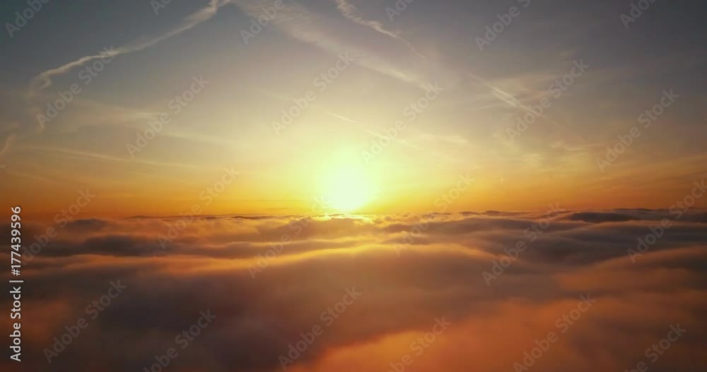 4K time lapse video of floating clouds in sunset
