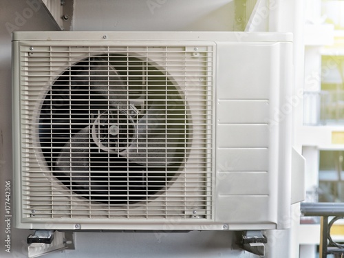 Air conditioner compressor closeup.
