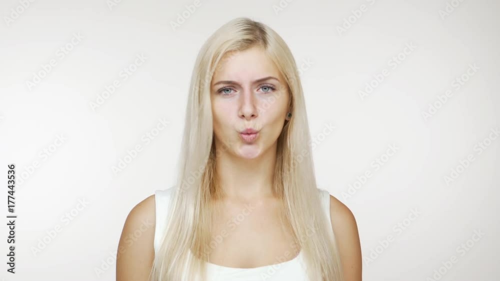 portrait of blondie strict woman politely expressing denial waving head in refusal over white background. Concept of emotions portrait of blondie strict woman politely expressing denial waving head in refusal over white background. Concept of emotions