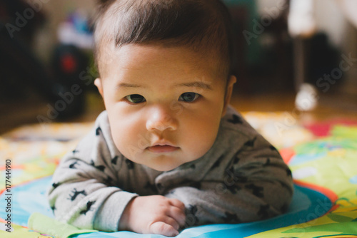 Baby boy on stomach for tummy time