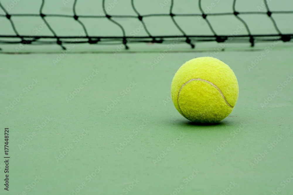 old tennis ball in the tennis court