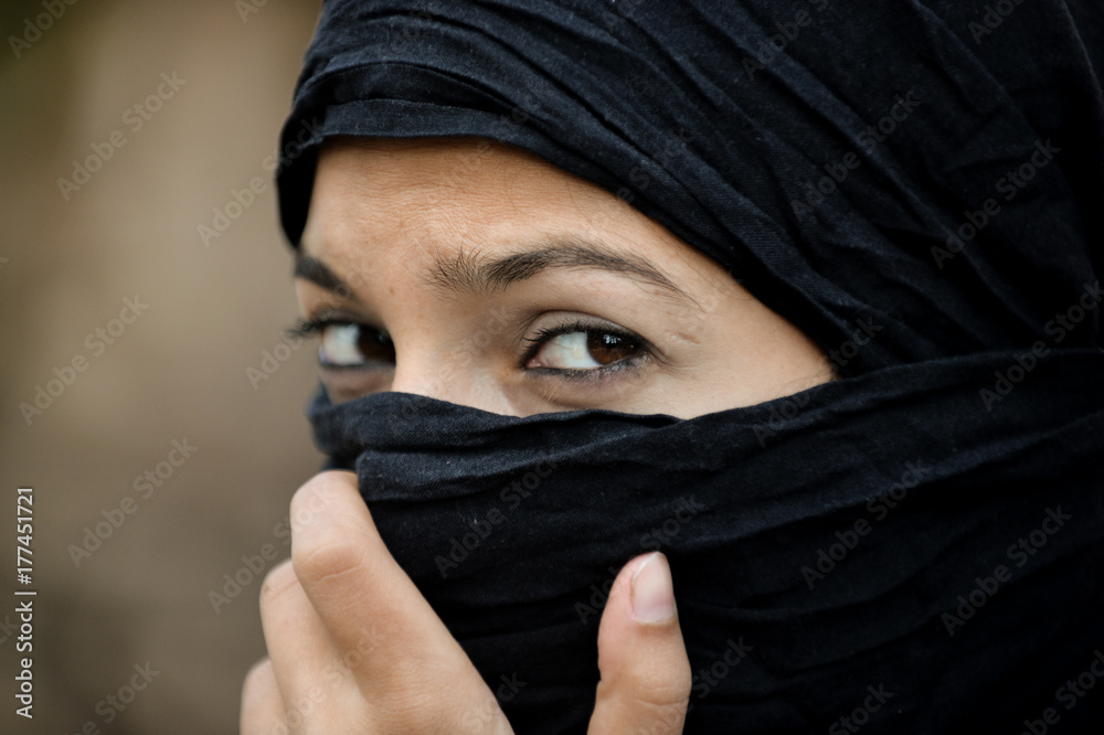 Woman with hijab looking at camera Woman with hijab looking at camera
