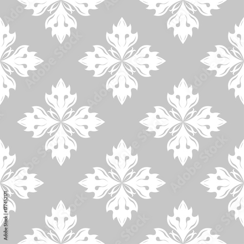 White flowers on gray background. Ornamental seamless pattern