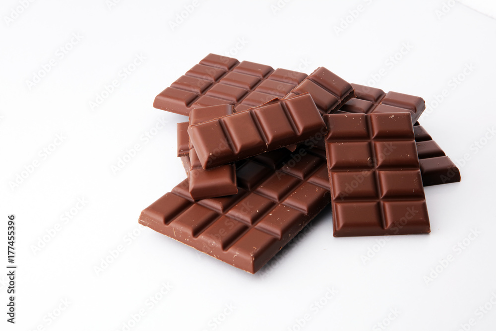 close up of chocolate bars isolated on white background. close up of chocolate bars isolated on white background.