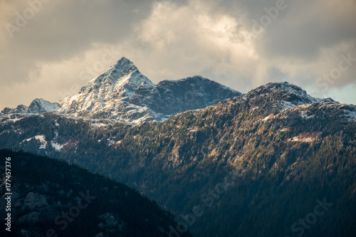 Snowy Peak with clouds in background © Braeden