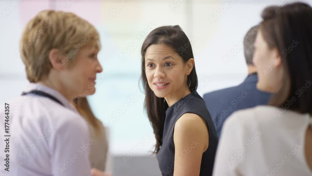 Business group clapping motivational speaker at business seminar Business group clapping motivational speaker at business seminar