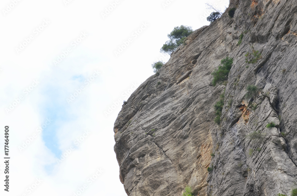 Rocky mountain at the hiking trail area of Chillapajaros, in Montanejos (Castellon - Spain). Natural and beautiful landscape. Climbing zone. Limited sunlight