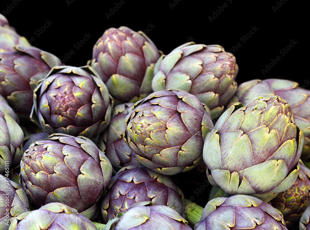 Artichokes on a black background Artichokes on a black background