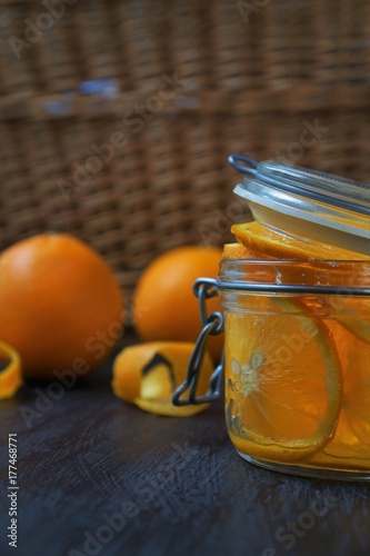 Orange in glass, jam preparetion photo