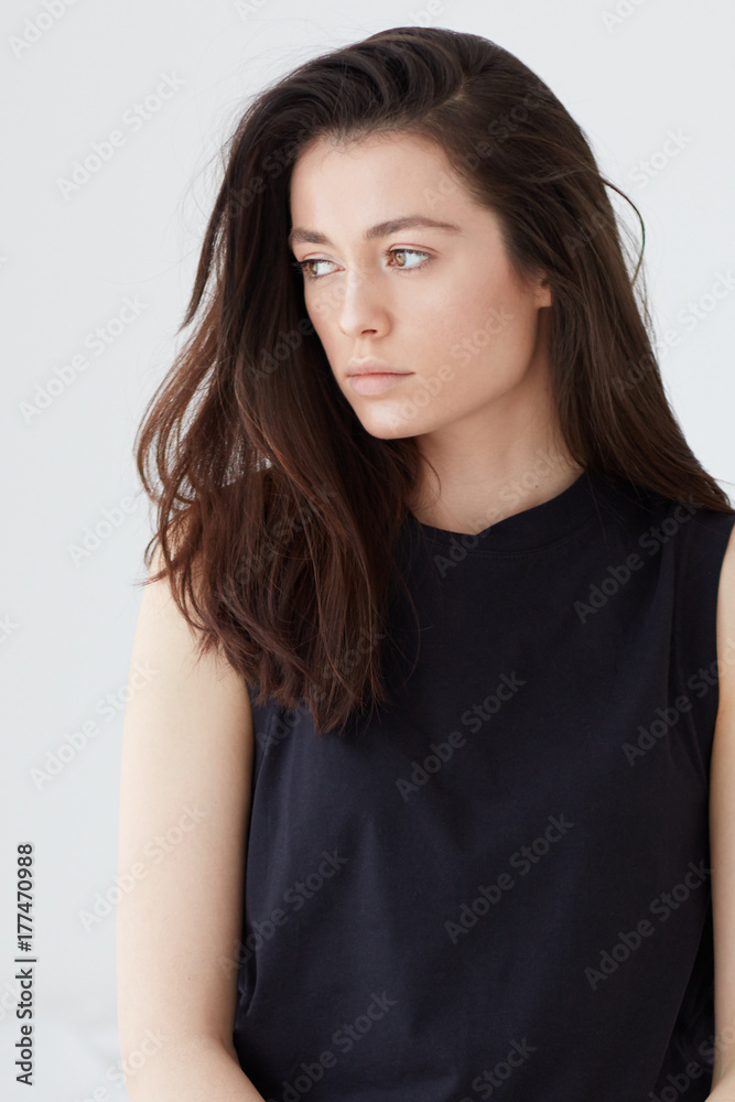 young female posing on model test photo shoot with natural day light