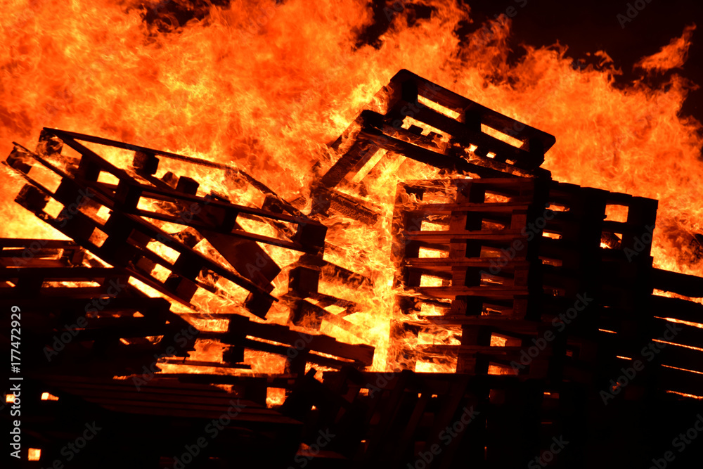 Wooden pallets on a burning bonfire