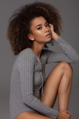 Beautiful african american female model. Natural photo without retouch