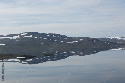 Landscape at the lake Guolasjávri, water reflection, Norway, summer  photo