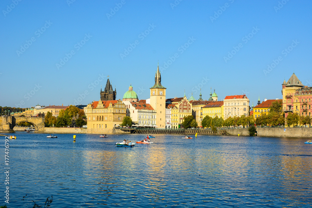 Cityscape of Prague old town, its towers, Vltava river, Charles bridge, St. Francis of Assisi church. One of the most famous areas of Czech Republic capital