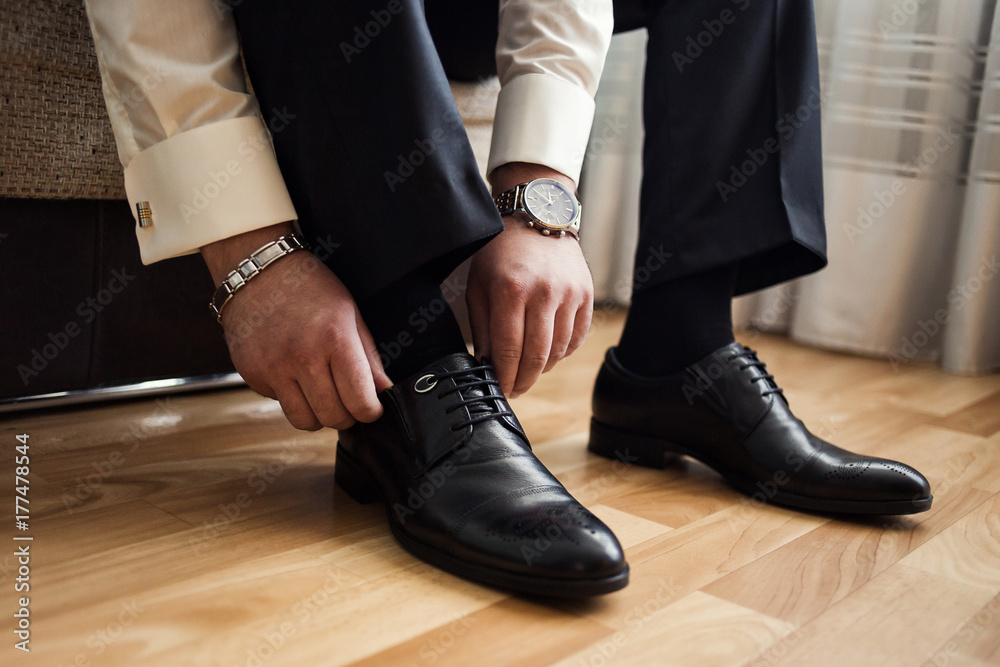 man fashion, men's Accessories,businessman clothes shoes, Politician, man's style, Businessman buttoning his shirt,American, European businessman, People, business, fashion and clothing concept man fashion, men's Accessories,businessman clothes shoes, Politician, man's style, Businessman buttoning his shirt,American, European businessman, People, business, fashion and clothing concept