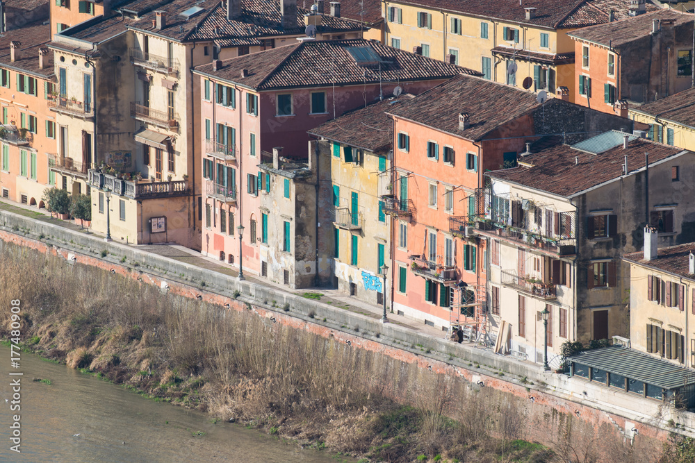 Typical houses on the banks of the Adige river in Verona.
