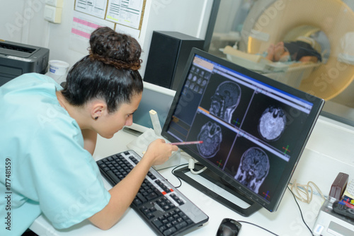 radiologist monitoring the examination