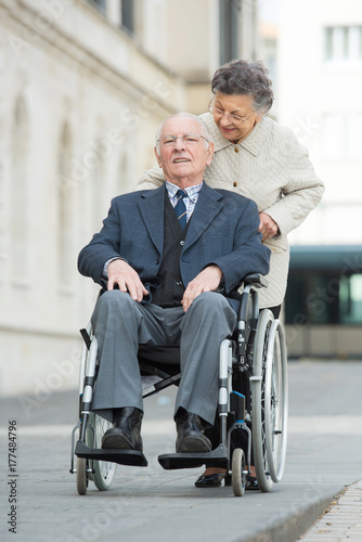 old couple enjoying outside
