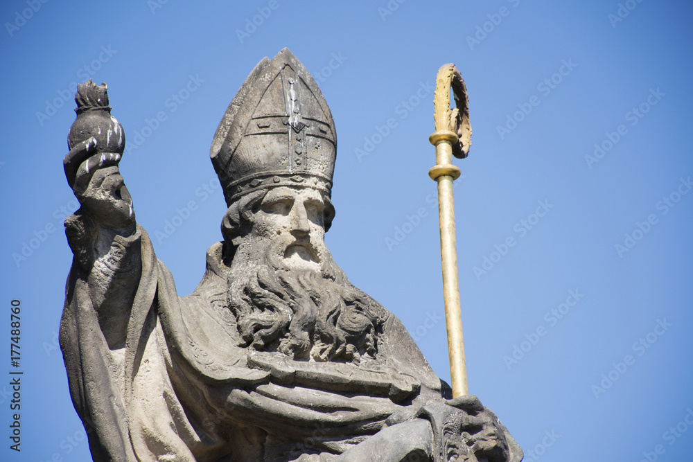 St. Augustinus or Augustine of Hippo Statue for Czechia people and foreigner travelers visit at Charles Bridge