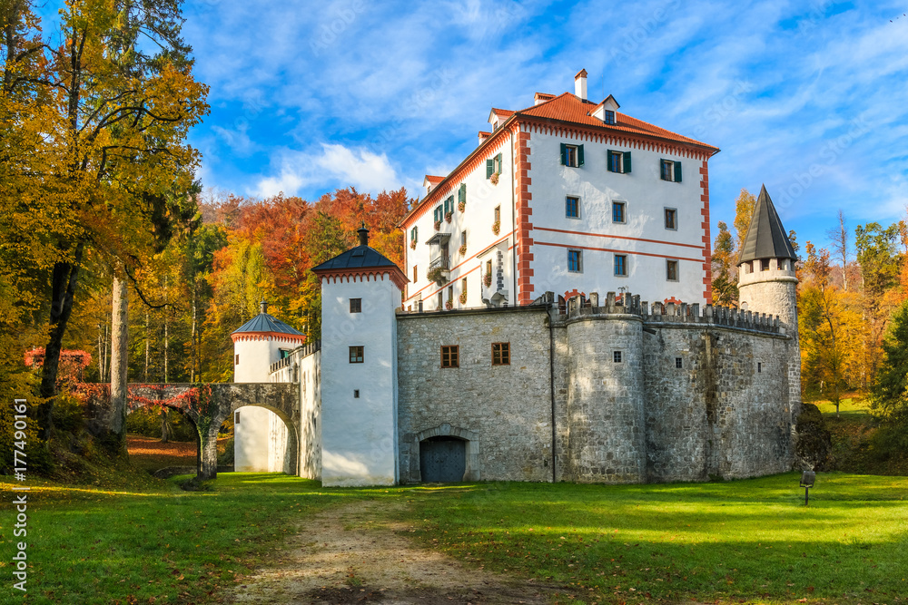 The picturesque 13th-century Sneznik Castle (Grad Snežnik, Schloß Schneeberg) in autumn, located in Loška Dolina, Slovenia