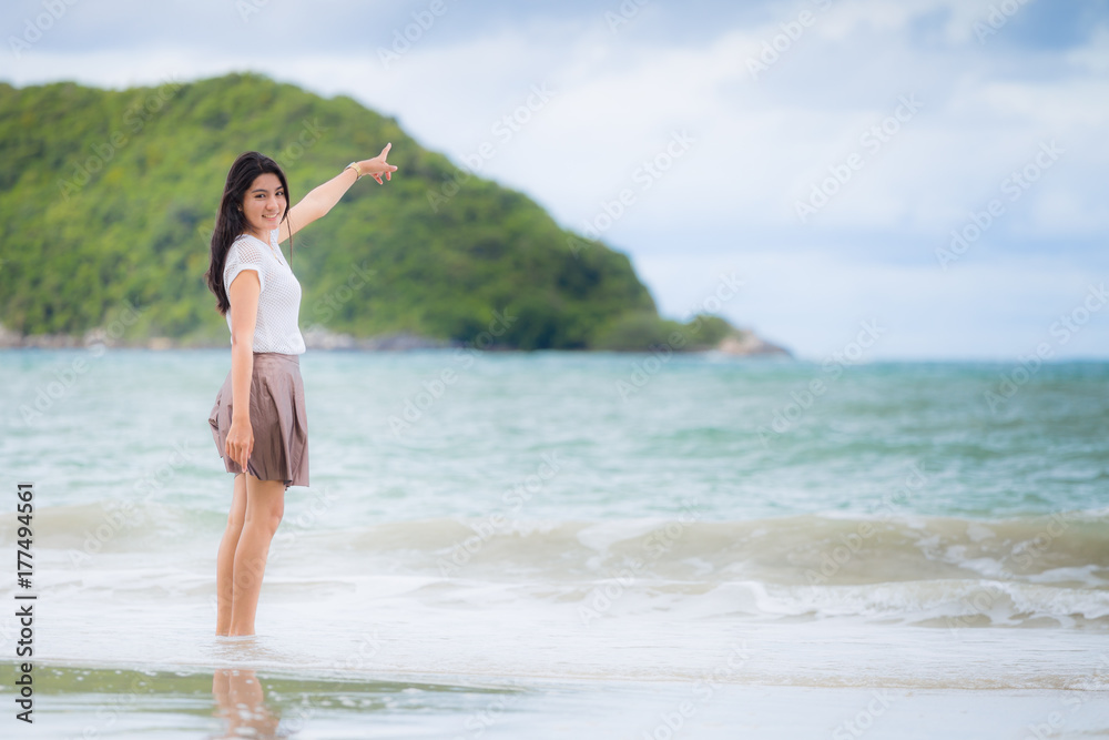 Beautiful Asian woman vacation on beach of Thailand Beautiful Asian woman vacation on beach of Thailand
