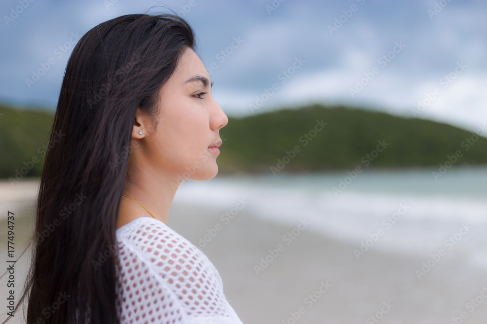 Beautiful Asian woman vacation on beach of Thailand Beautiful Asian woman vacation on beach of Thailand