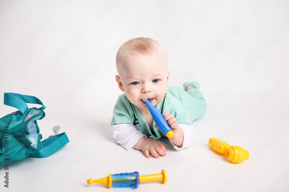 Baby Dressed up like a doctor in scrubs Baby Dressed up like a doctor in scrubs