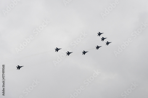combat aircraft on cloudy sky