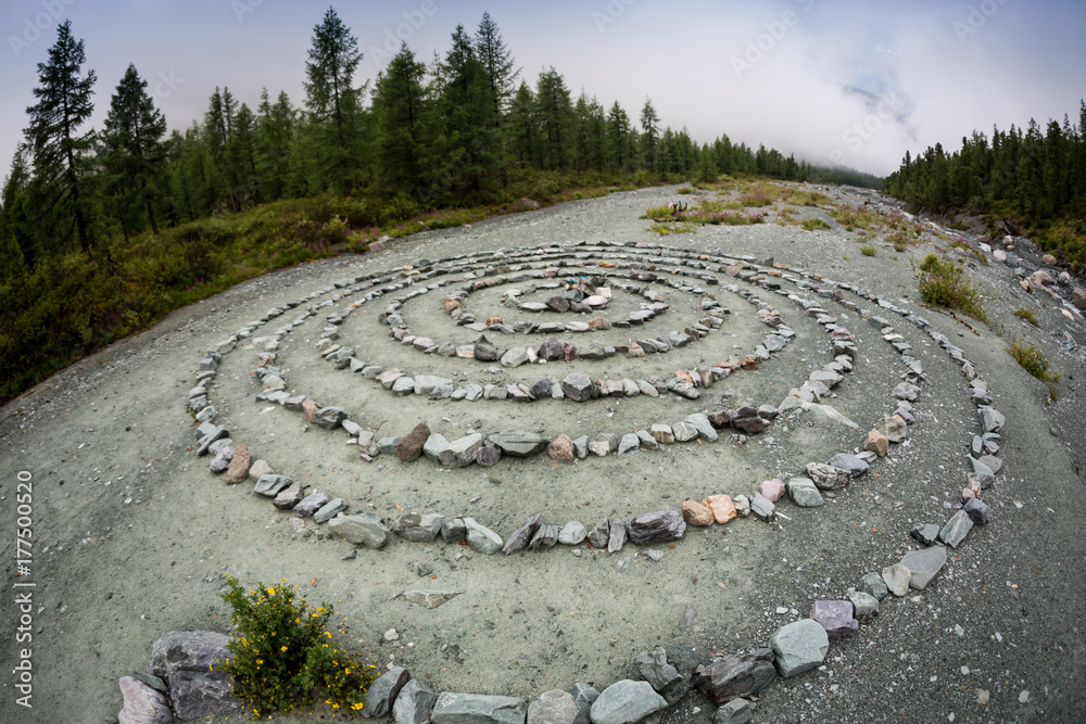 Old labyrinth meditation maze of stone.