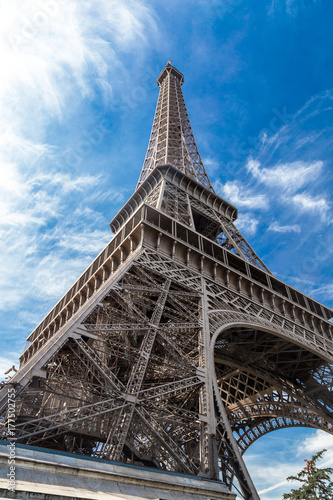 Eiffel Tower in Paris, France on a blue sky © Ruslan Gilmanshin