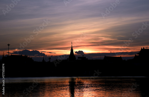 Silhouettes of pagoda at scenic sunset