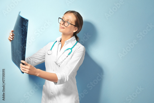 Female doctor with x-ray im...