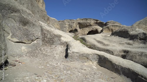 Panoramic view of Uplistsikhe, an ancient rock-hewn town near Gori in Georgia photo