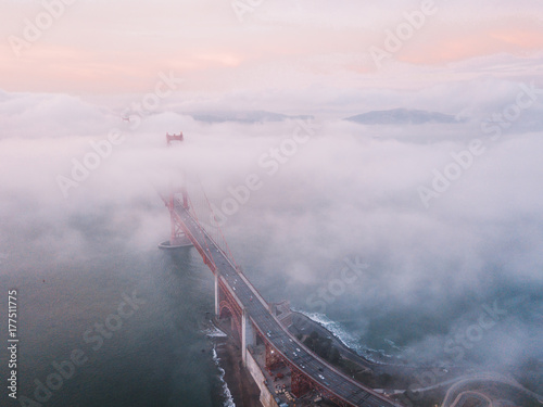 Beautiful San Francisco view from above with Golden gate bridge aerial view and Alcatraz island during cloudy weather