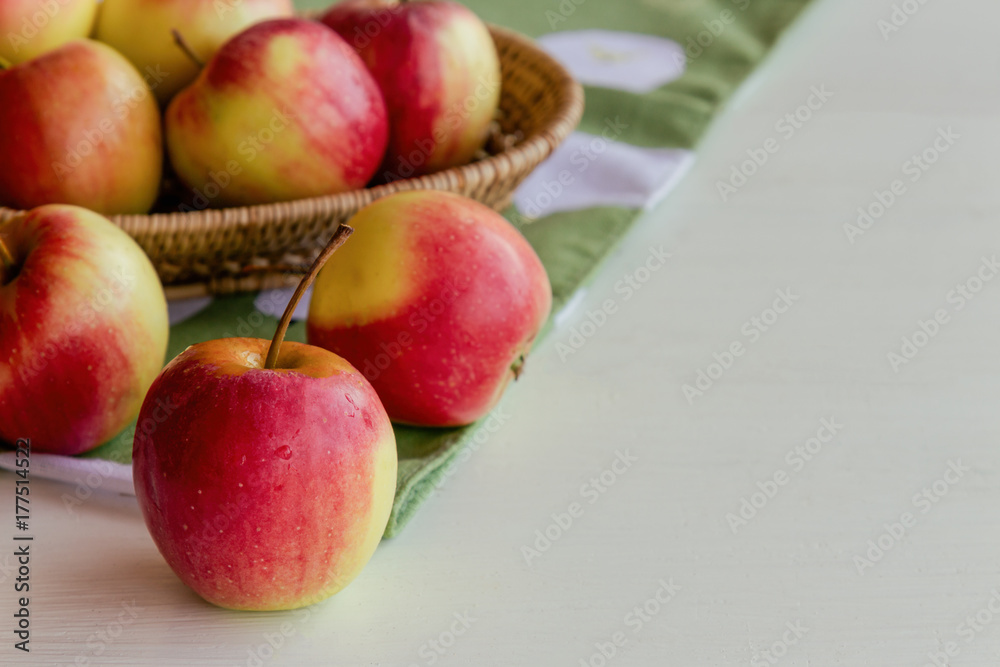 Fresh red fuji apple and in basket put on wood table for background or wallpaper in vintage tone style. Delicious sweet and juicy fuji for goodness cooking or bakery.Fuji apple has origins in Japan. Fresh red fuji apple and in basket put on wood table for background or wallpaper in vintage tone style. Delicious sweet and juicy fuji for goodness cooking or bakery.Fuji apple has origins in Japan.